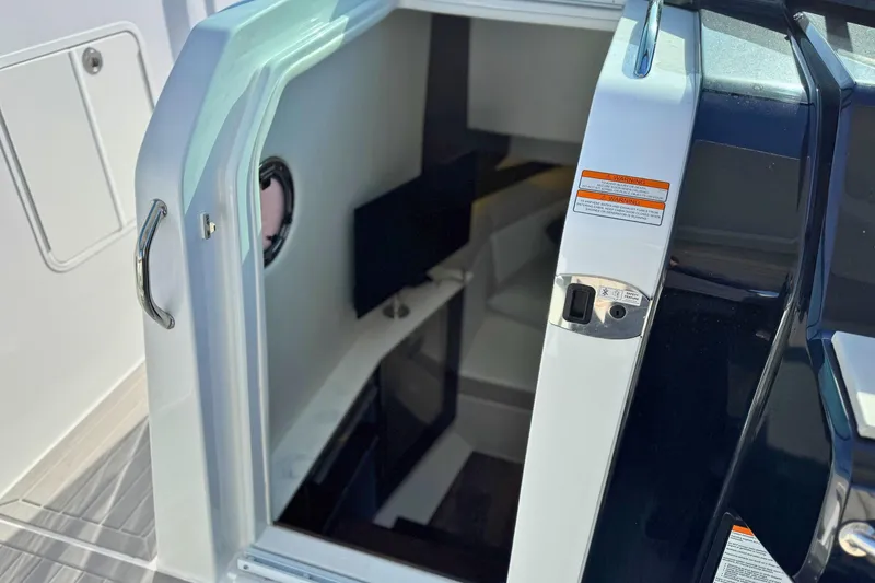 Slide: The Image of 2024 Cruisers Yachts 38 GLS OB cabin entrance with sleek interior design. - 42