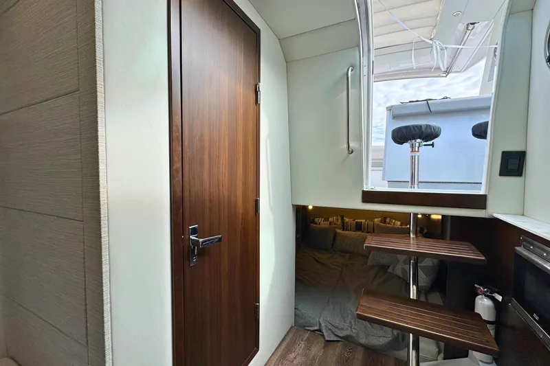 Slide: The Image of Interior of 2024 Cruisers Yachts 38 GLS OB, featuring cozy cabin and modern design elements. - 52