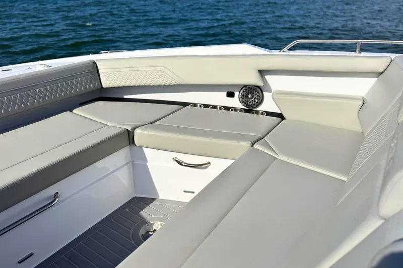 Slide: The Image of Luxurious seating area on 2024 Cruisers Yachts 38 GLS OB, overlooking the ocean. - 61