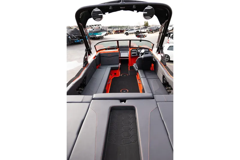Slide: The Image of 2026 MasterCraft NXT24 boat interior with sleek seating and modern design. - 12