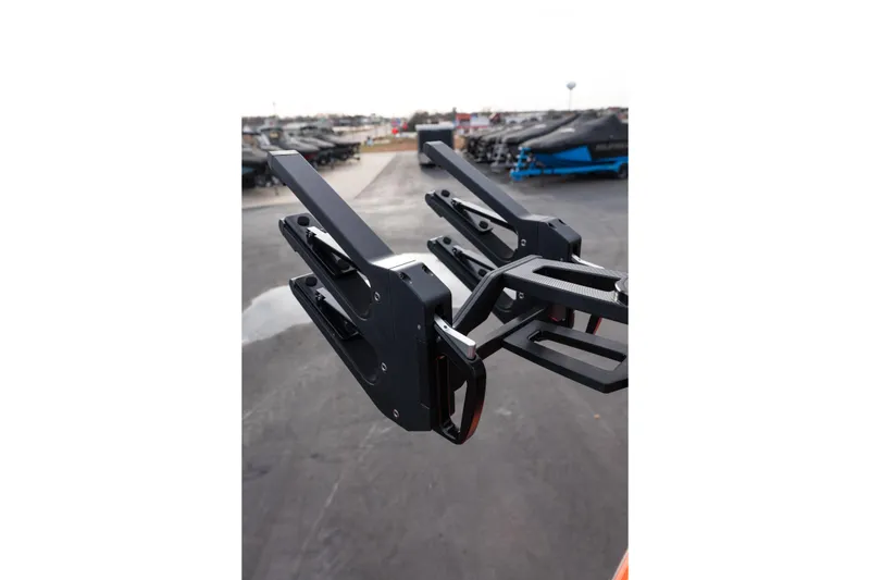 Slide: The Image of 2026 MasterCraft NXT24 boat accessory detail in a marina setting. - 17