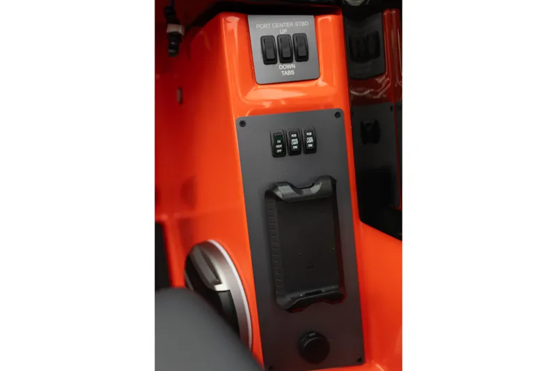 Slide: The Image of Control panel of 2026 MasterCraft NXT24 boat with orange interior. - 20