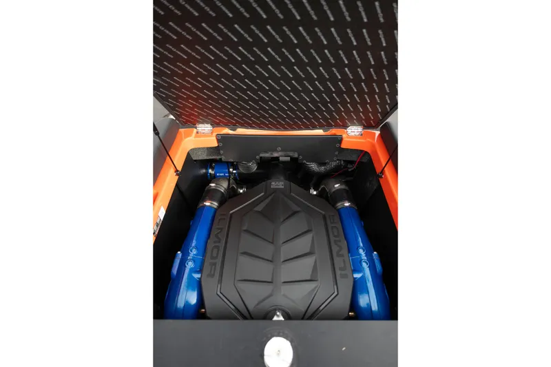 Slide: The Image of 2026 MasterCraft NXT24 engine compartment with Ilmor engine and blue components. - 36