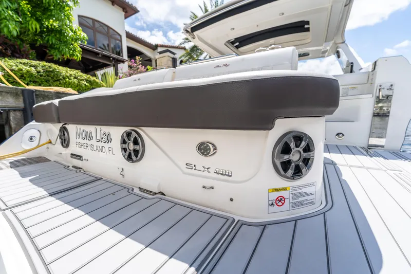 Slide: The Image of 2019 Sea Ray SLX 400 Outboard boat with speakers, docked at Fisher Island, FL. - 34