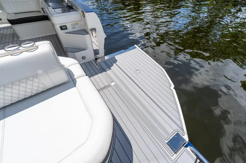 Slide: The Image of 2019 Sea Ray SLX 400 Outboard boat deck with luxurious seating and water view. - 36
