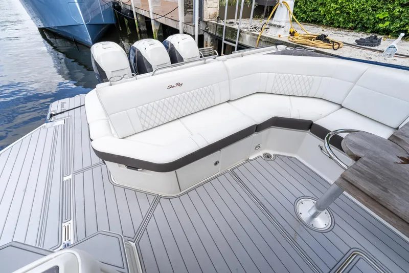 Slide: The Image of 2019 Sea Ray SLX 400 Outboard with luxurious seating and sleek deck design. - 59