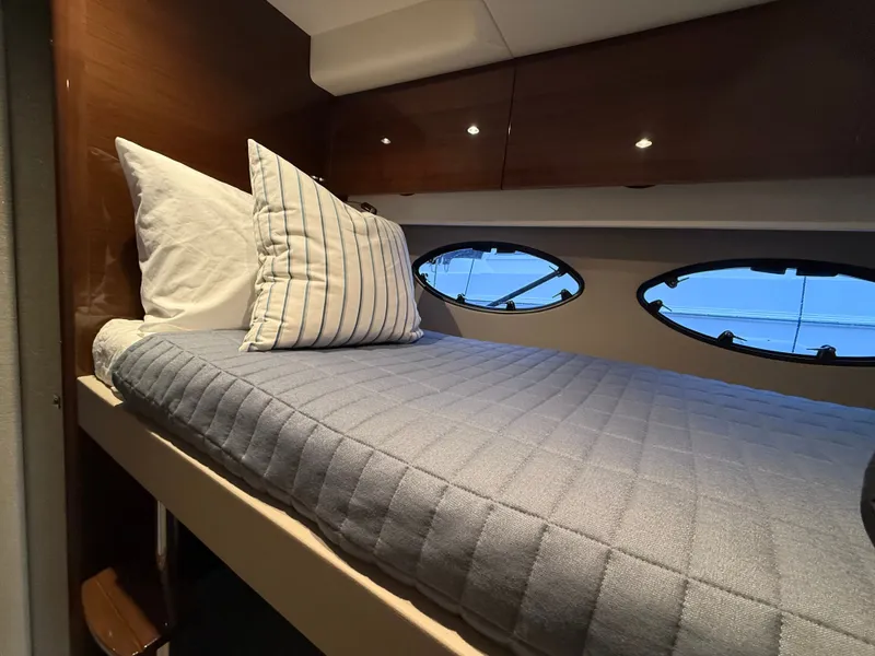 Slide: The Image of Interior of a 2018 Princess F49 yacht with cozy bed. - 12