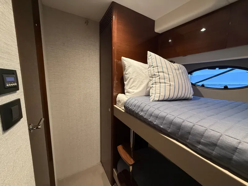Slide: The Image of Interior of a 2018 Princess F49 yacht with bunk bed. - 13