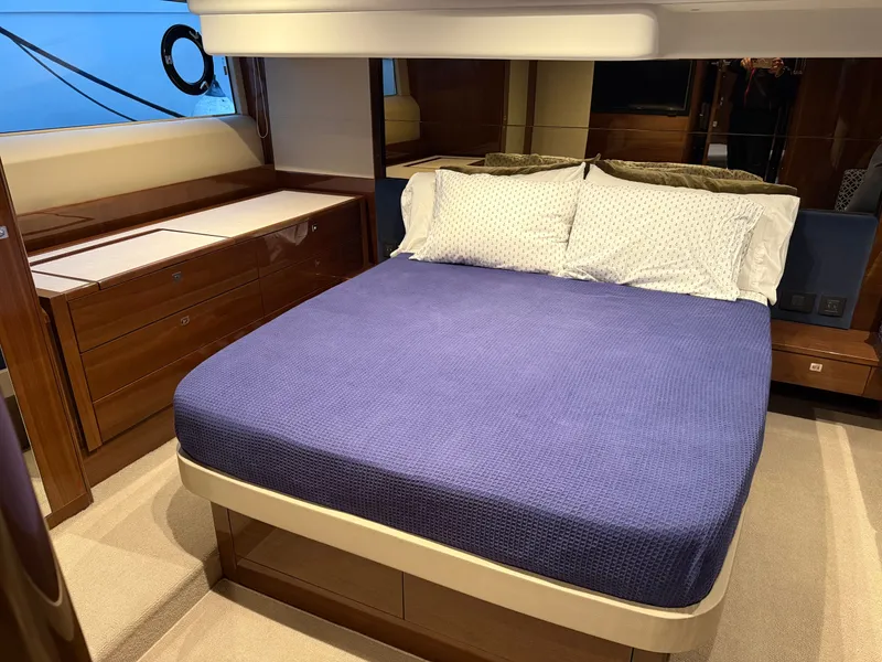 Slide: The Image of Luxurious bedroom on a 2018 Princess F49 yacht. - 20