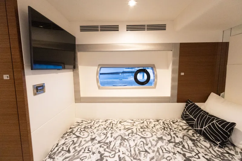 Slide: The Image of Luxurious cabin of 2017 Ocean Alexander Evolution with window and TV. - 26