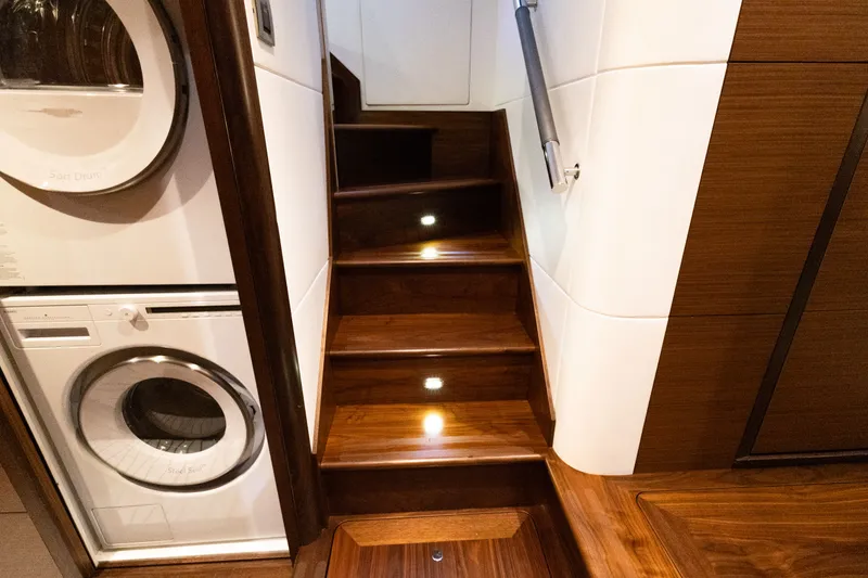 Slide: The Image of Interior of 2017 Ocean Alexander Evolution with washer and wooden stairs. - 36