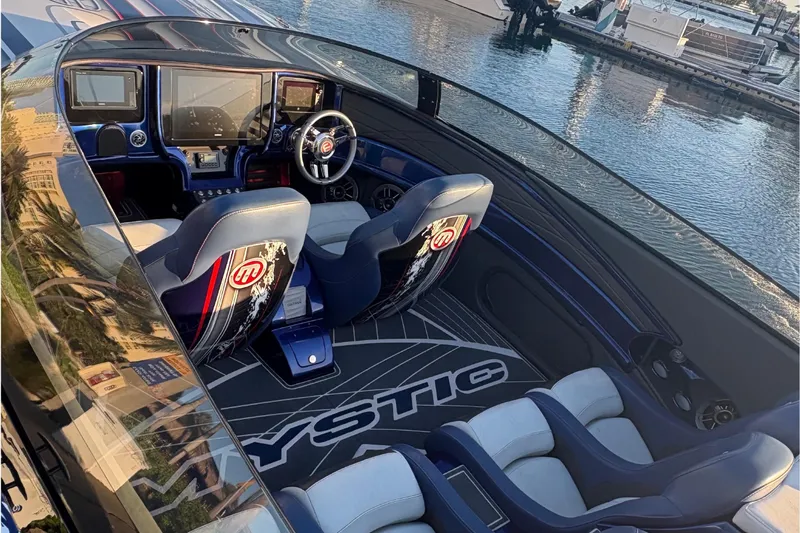 Slide: The Image of Interior of a 2018 Mystic Powerboats C4400 with luxurious design. - 8
