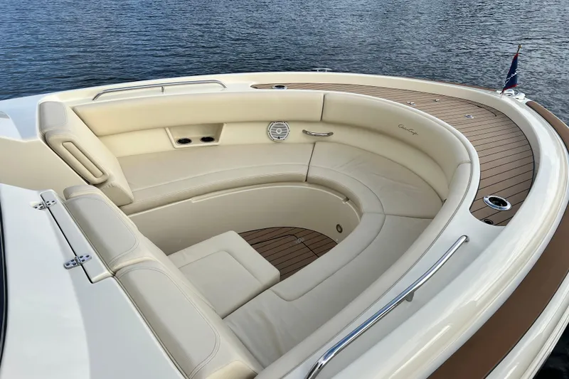 Slide: The Image of 2023 Chris-Craft Calypso 30 boat with elegant seating and teak deck. - 18