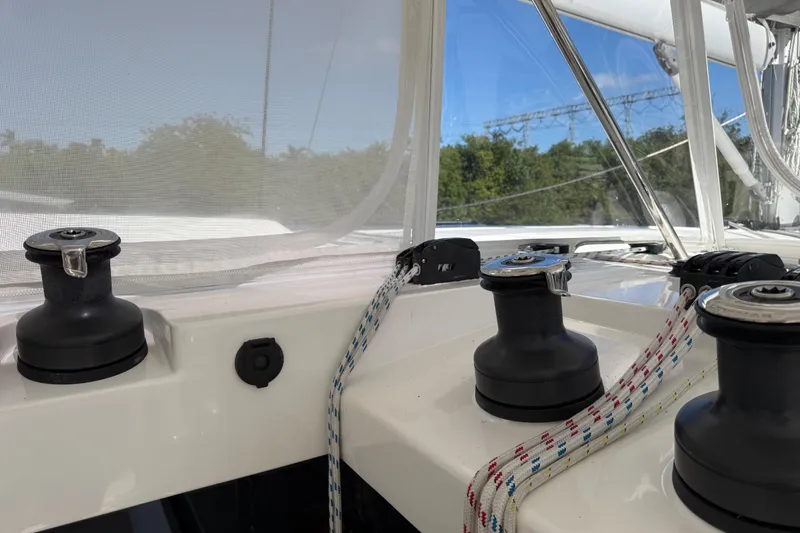 Slide: The Image of Winches and ropes on a 2024 Leopard 45 catamaran deck. - 10