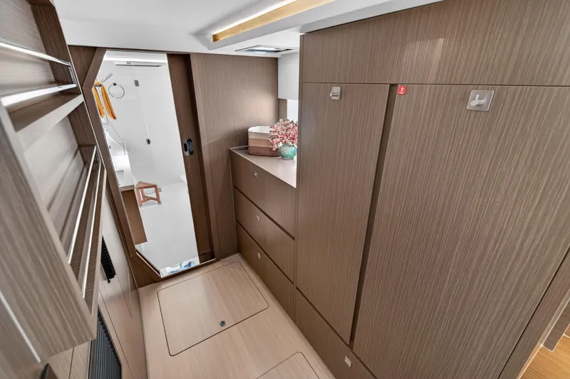 Slide: The Image of Modern interior of 2024 Leopard 45 yacht featuring sleek wood cabinetry and elegant design. - 100