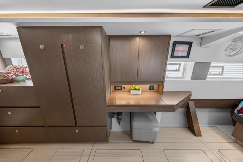 Slide: The Image of Luxurious interior of 2024 Leopard 45 yacht with modern wood cabinetry and sleek design. - 102