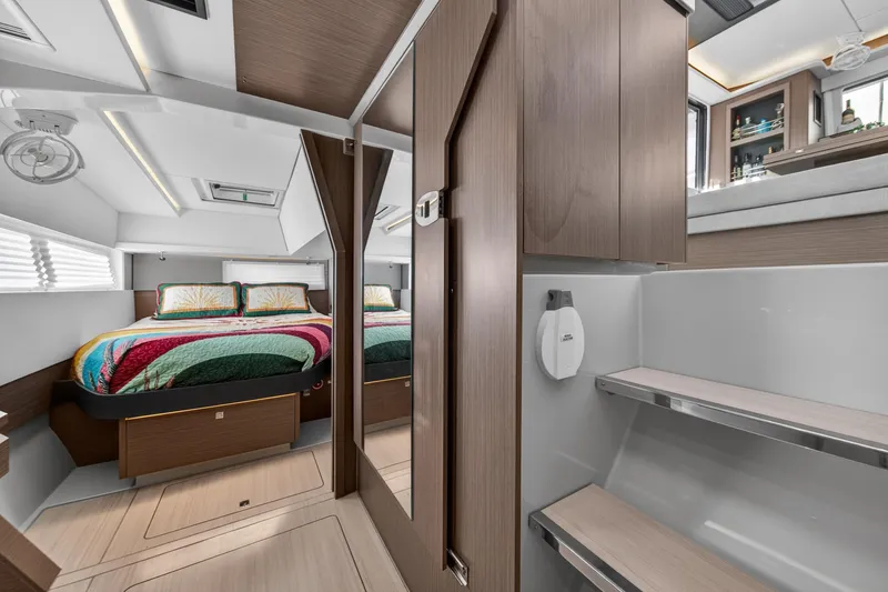Slide: The Image of Luxurious interior of 2024 Leopard 45 yacht featuring a cozy bedroom and modern design. - 103
