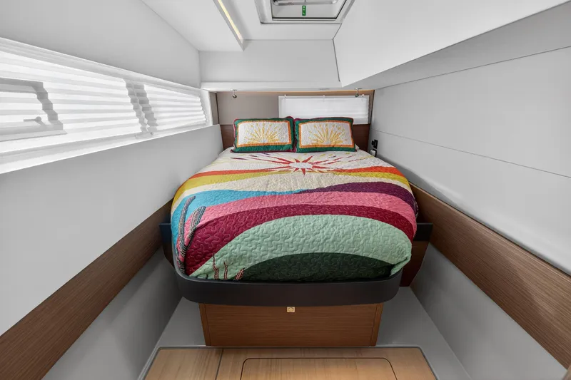 Slide: The Image of Luxurious cabin interior of 2024 Leopard 45 yacht with colorful bedding. - 104