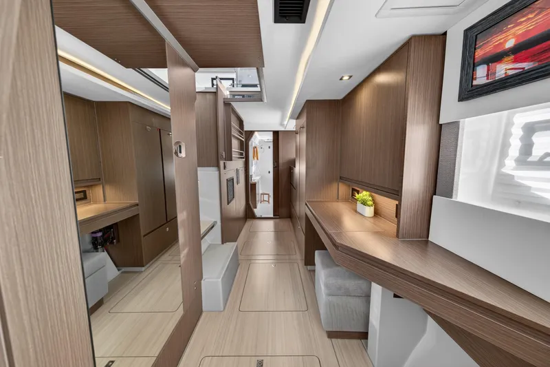 Slide: The Image of Modern interior of 2024 Leopard 45 yacht with sleek wood finishes and natural lighting. - 107