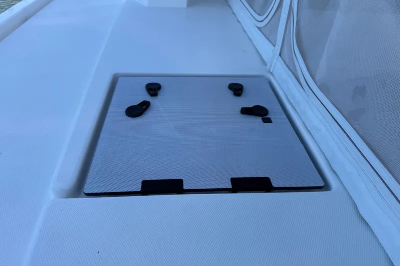 Slide: The Image of 2024 Leopard 45 yacht deck hatch with secure latches and sleek design. - 11