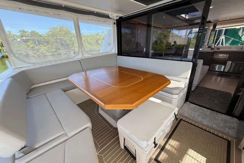 Slide: The Image of Luxurious interior of 2024 Leopard 45 yacht with elegant dining area and modern design. - 2