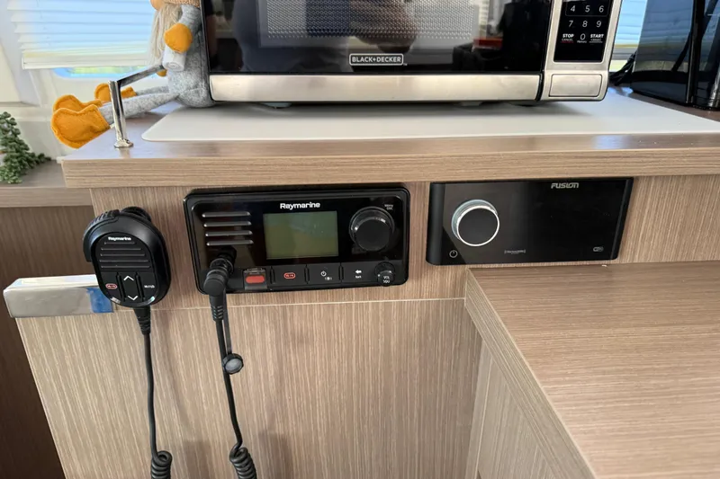 Slide: The Image of Control panel in 2024 Leopard 45 yacht with Raymarine and Fusion systems. - 20