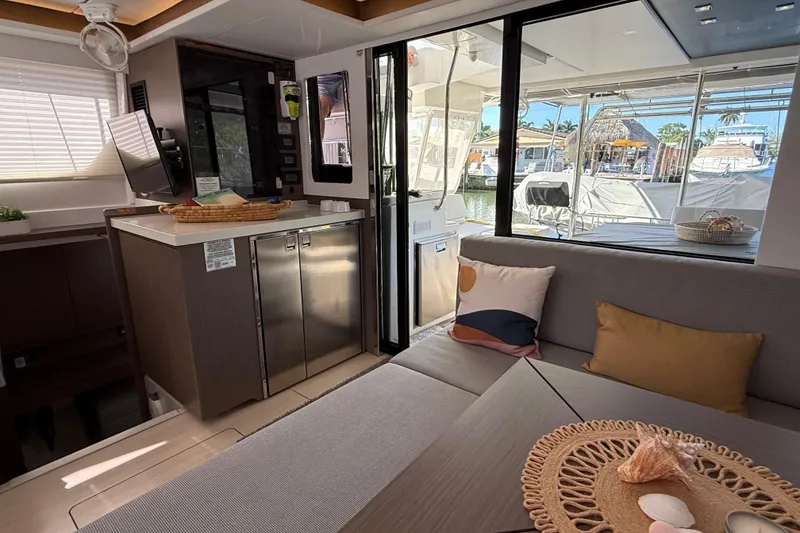 Slide: The Image of Interior of 2024 Leopard 45 yacht with modern decor and marina view. - 22