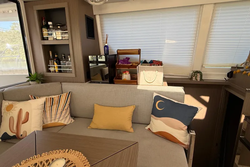 Slide: The Image of Luxurious interior of 2024 Leopard 45 yacht with cozy seating and decorative pillows. - 23