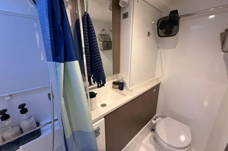 Slide: The Image of Modern bathroom in 2024 Leopard 45 yacht with shower, sink, and toilet. - 26