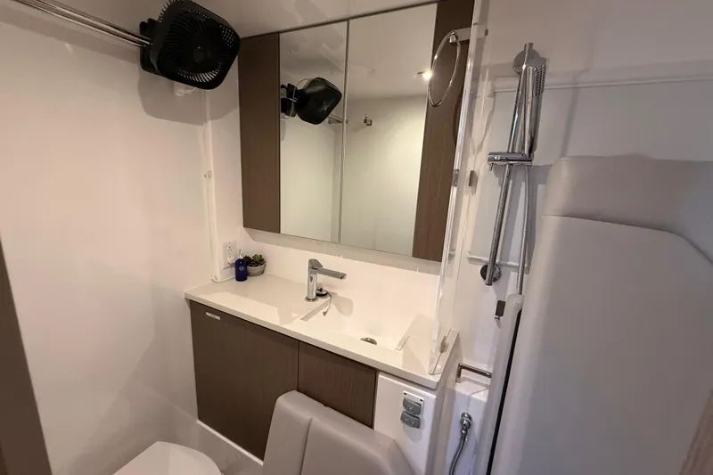 Slide: The Image of Modern bathroom in 2024 Leopard 45 yacht with sleek fixtures and mirror. - 27
