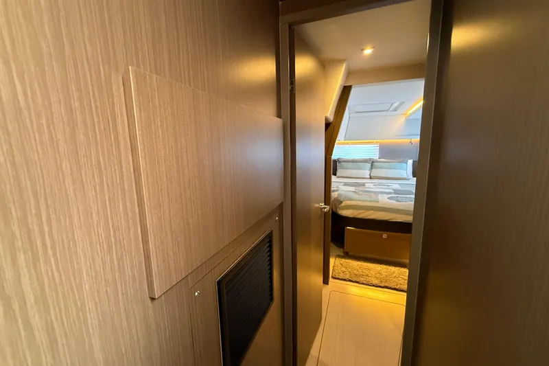 Slide: The Image of Luxurious interior of 2024 Leopard 45 yacht, featuring a cozy bedroom with modern design. - 28
