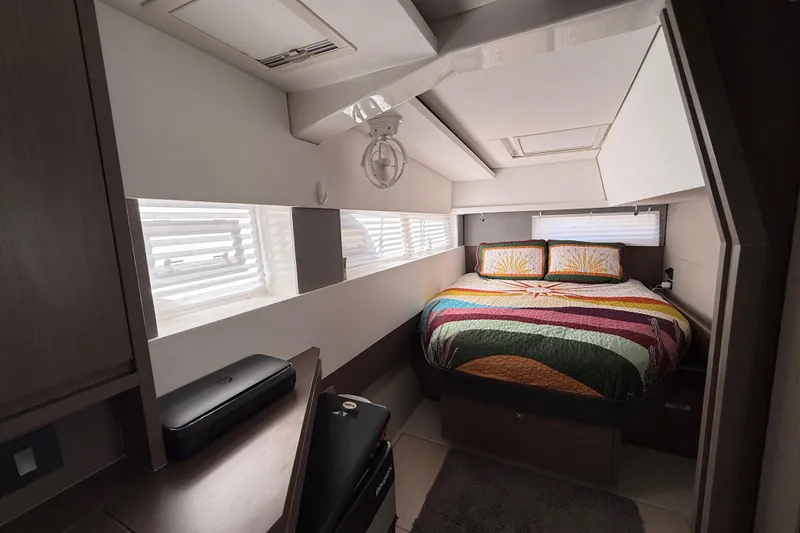 Slide: The Image of Luxurious cabin interior of 2024 Leopard 45 catamaran with colorful bedding and modern design. - 35