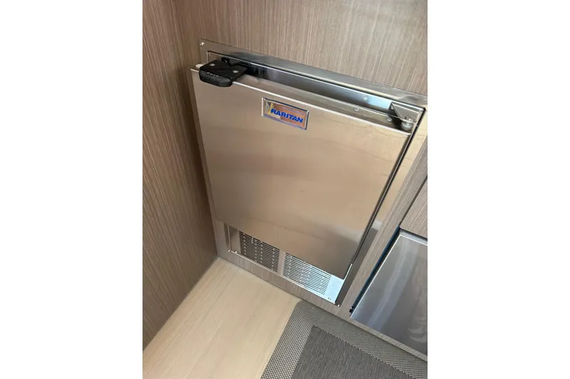 Slide: The Image of Stainless steel Raritan fridge in 2024 Leopard 45 yacht interior. - 39