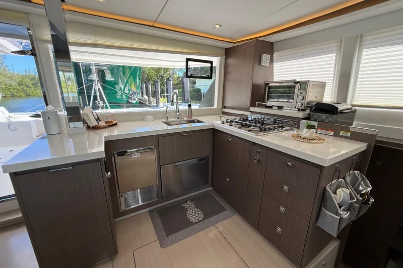 Slide: The Image of Modern kitchen interior on 2024 Leopard 45 yacht, featuring sleek appliances and ample counter space. - 44