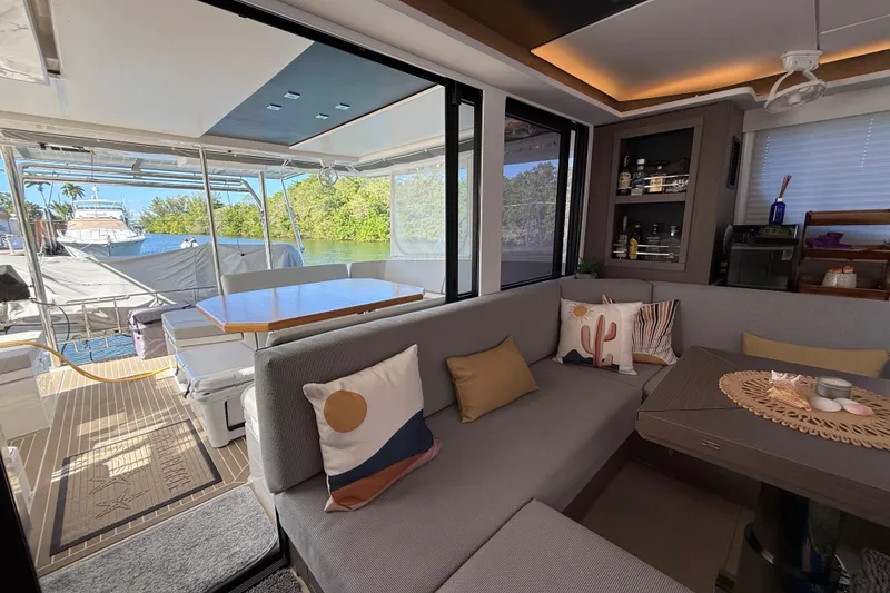 Slide: The Image of Luxurious interior of 2024 Leopard 45 yacht with modern seating and scenic view. - 52