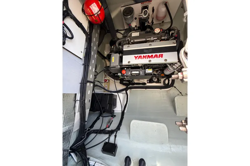 Slide: The Image of Engine room of 2024 Leopard 45 yacht featuring a Yanmar engine. - 58