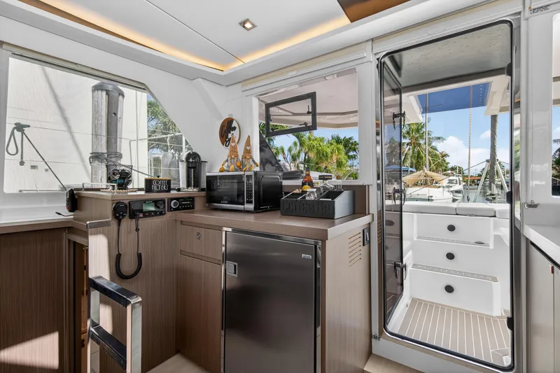 Slide: The Image of Interior of 2024 Leopard 45 yacht featuring modern kitchen and outdoor view. - 70