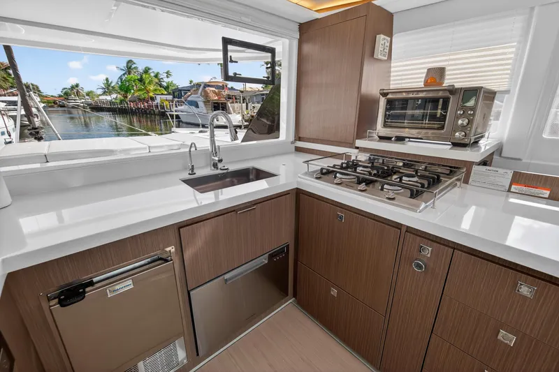 Slide: The Image of Modern kitchen in 2024 Leopard 45 yacht with stove, oven, and sleek cabinetry. - 73