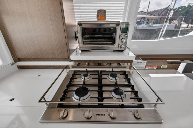 Slide: The Image of Modern kitchen in 2024 Leopard 45 yacht with stove and toaster oven. - 74
