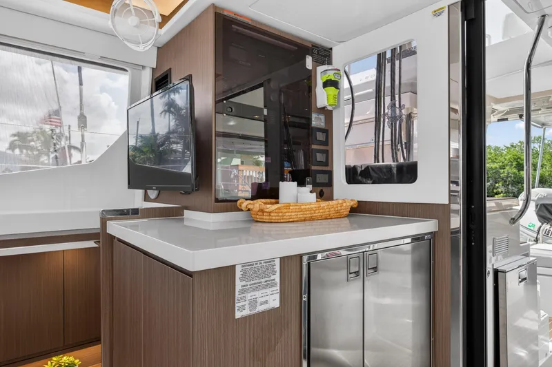 Slide: The Image of Modern kitchen area in 2024 Leopard 45 yacht with sleek cabinetry and appliances. - 77