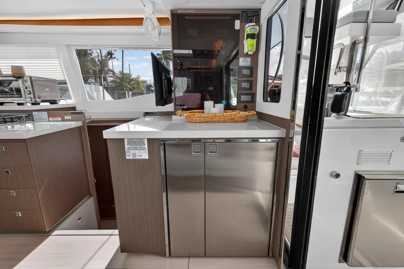 Slide: The Image of Modern kitchen area in a 2024 Leopard 45 yacht with sleek cabinetry and appliances. - 78