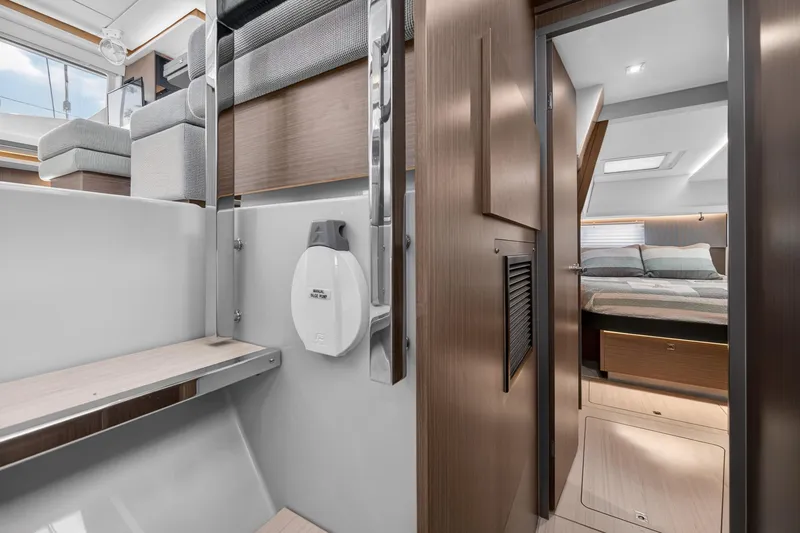 Slide: The Image of Interior of 2024 Leopard 45 yacht, featuring modern design with cozy bedroom and sleek furnishings. - 83