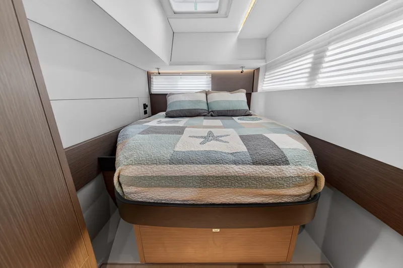 Slide: The Image of Cozy bedroom interior in 2024 Leopard 45 yacht with quilted bedding and modern design. - 84
