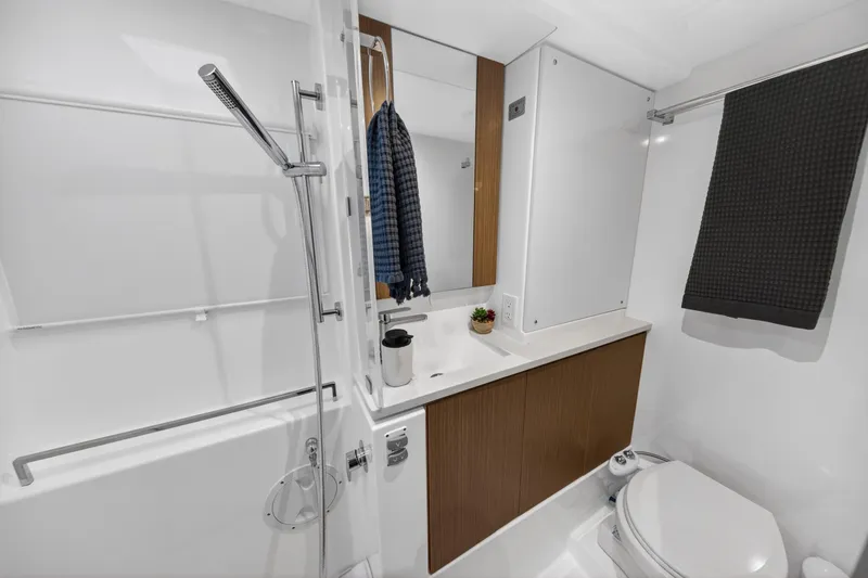 Slide: The Image of Modern bathroom in 2024 Leopard 45 yacht with shower, sink, and toilet. - 88