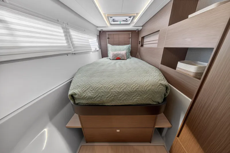 Slide: The Image of Luxurious cabin interior of 2024 Leopard 45 yacht with cozy bed and modern design. - 91