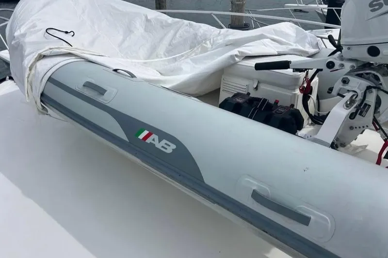 The Image of 2022 AB Inflatables Navigo 12 VS boat with motor, covered on deck. - 0