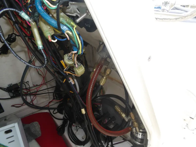 Slide: The Image of Wiring inside a 2006 Cobia 214 Center Console boat. - 19