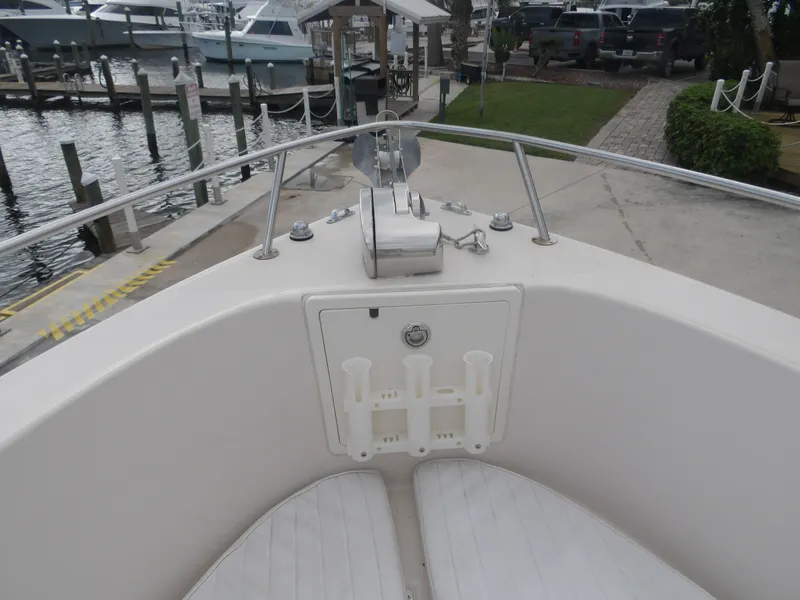 Slide: The Image of 2006 Cobia 214 Center Console at dock, front view. - 23