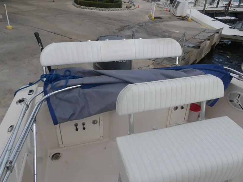Slide: The Image of 2006 Cobia 214 Center Console boat at dock. - 27