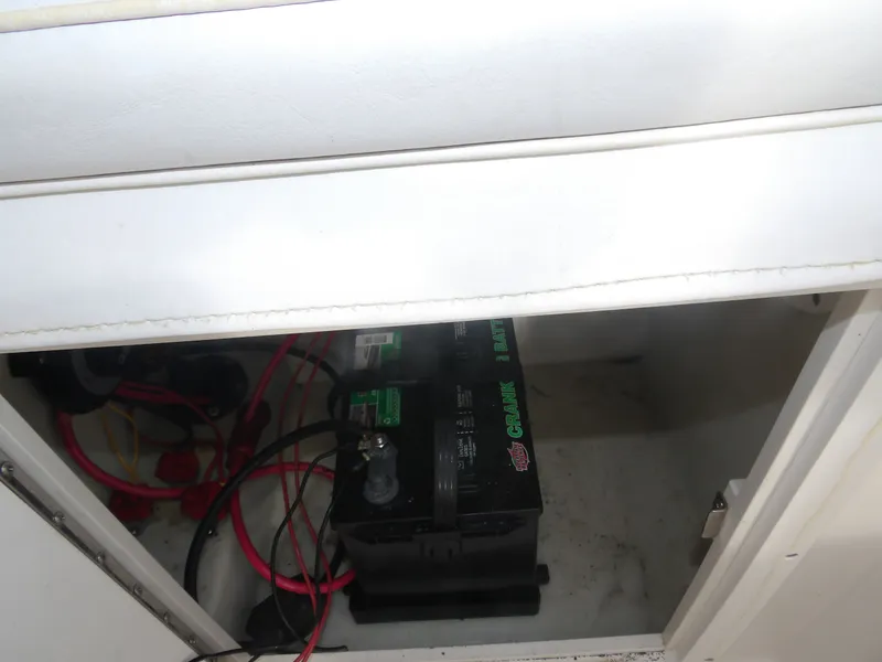 Slide: The Image of Battery in storage compartment of 2006 Cobia 214 Center Console boat. - 30